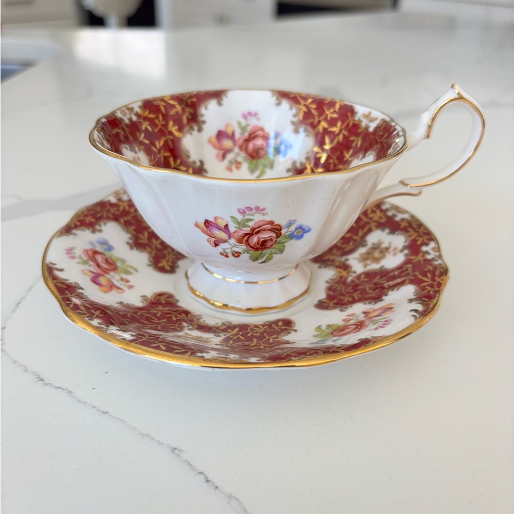 Floral Teacup and Saucer Set with Gold Accents